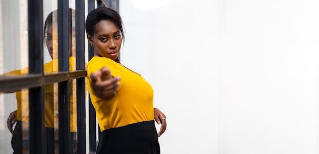 Attractive young african american confident businesswoman working in office