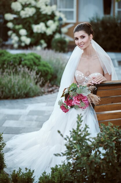 Attractive young bride in wedding dress