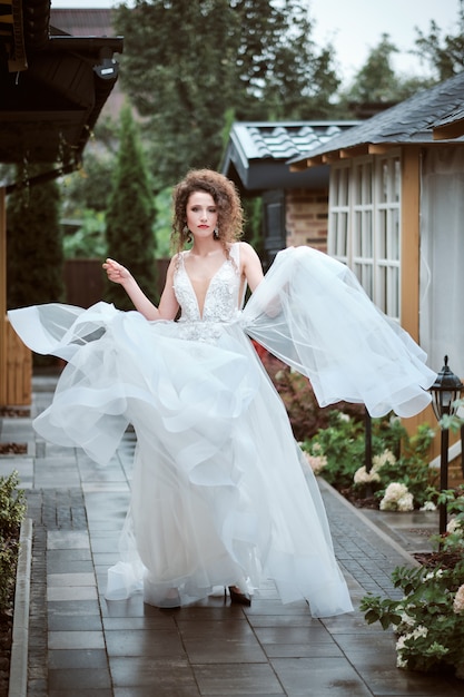 Attractive young bride in wedding dress