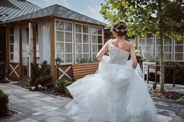 Attractive young bride in wedding dress
