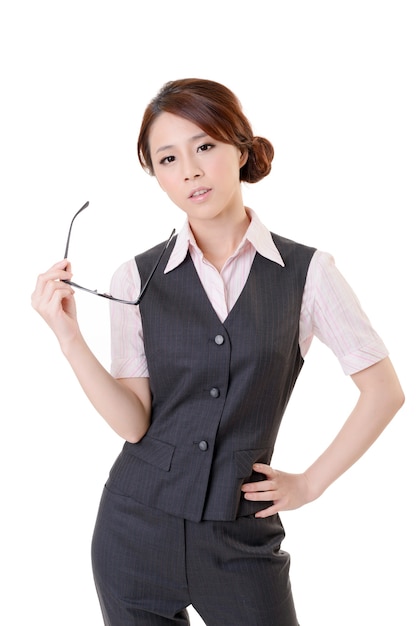 Attractive young business woman of Asian, closeup portrait on white wall.