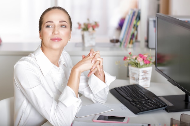 Attractive young business woman working  in the office