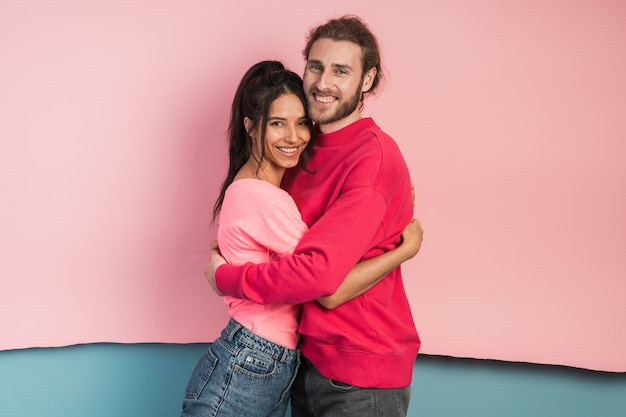 Attractive, young couple hugging