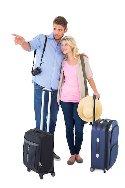 Attractive young couple ready to go on vacation