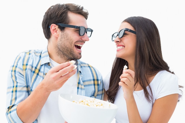 Attractive young couple watching a 3d movie