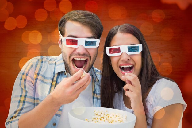 写真 クリスマス ライトのクローズ アップに対して 3 d 映画を見て魅力的な若いカップル