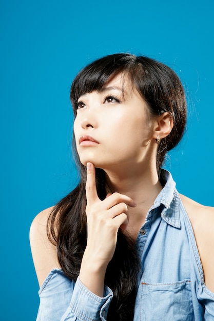 Attractive young girl of Asian, closeup portrait