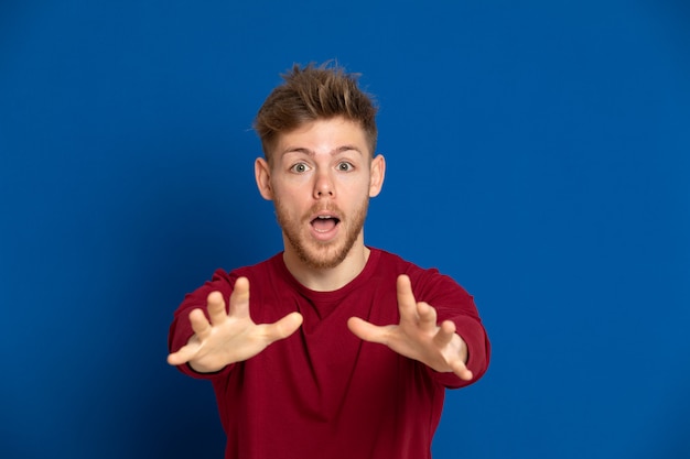 Attractive young guy with a red T-shirt