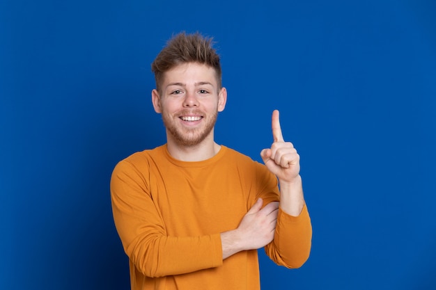 Attractive young guy with a yellow T-shirt