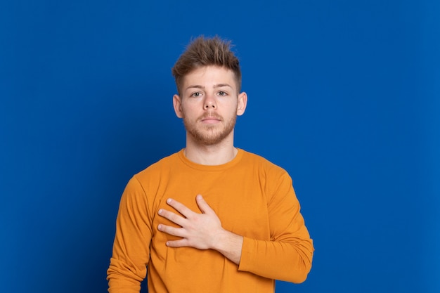 Attractive young guy with a yellow T-shirt