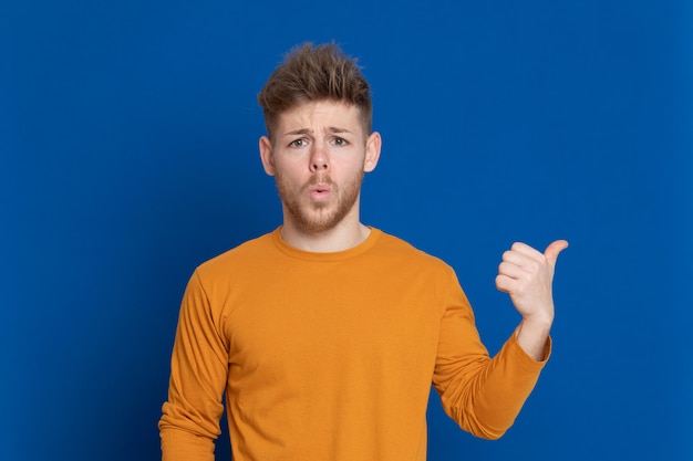 Attractive young guy with a yellow T-shirt