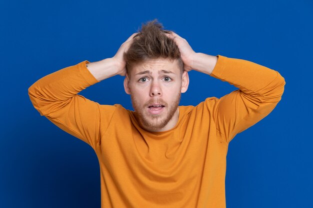 Attractive young guy with a yellow T-shirt