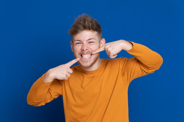 Attractive young guy with a yellow T-shirt