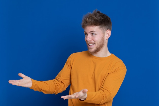 Attractive young guy with a yellow T-shirt