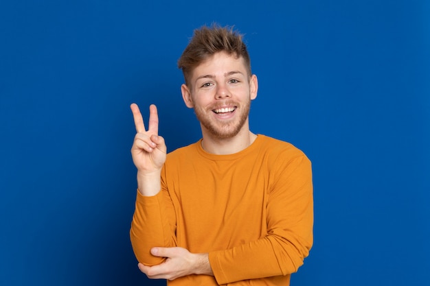 Attractive young guy with a yellow T-shirt