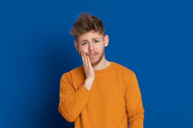 Attractive young guy with a yellow T-shirt