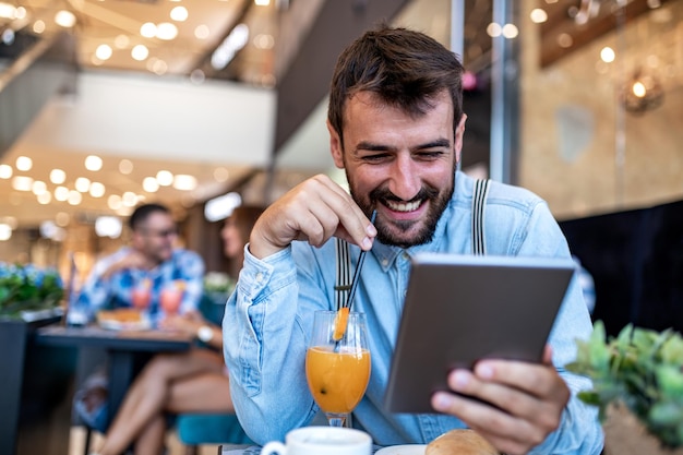 Attractive young man in the restaurant