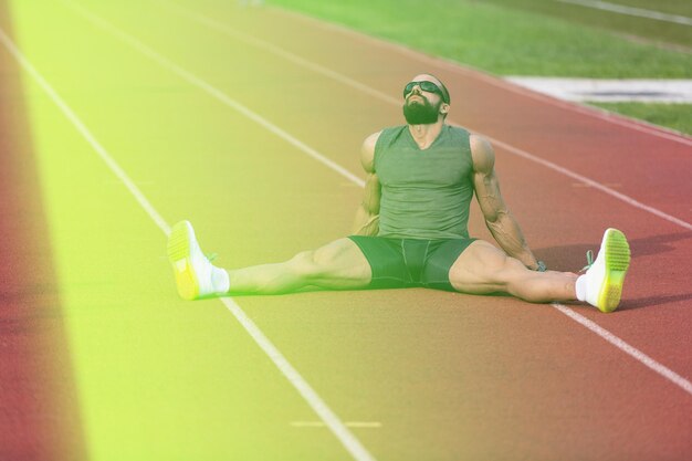 Attractive Young Man Resting After Running Outside