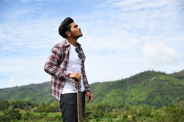 Attractive young man on vacation jungle tour