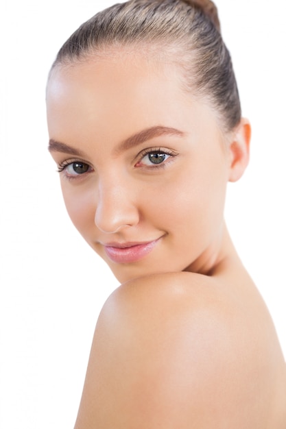 Attractive young model in close up against white background