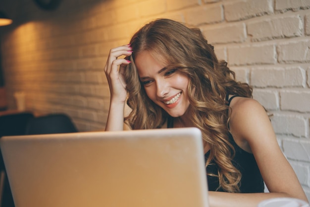 Attractive young teenager surfing the internet