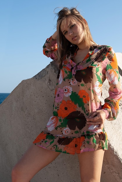 Attractive young woman in a coastal environment near the sea