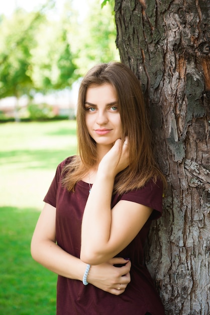 Attractive young woman enjoying her time outside in the park