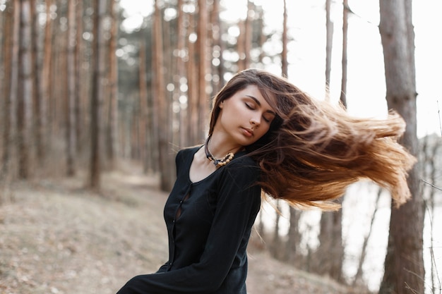 Attractive young woman enjoying her time outside in park