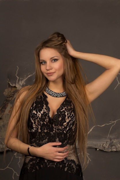 Attractive  young woman in an evening dress. Closeup shot