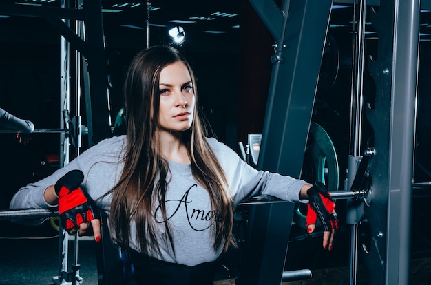Attractive young woman in the gym