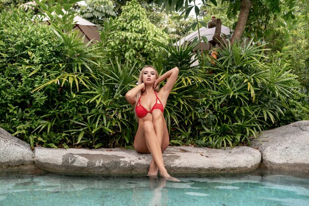 Attractive young woman posing in swimsuit