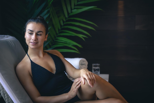 Attractive young woman relaxing in a spa complex