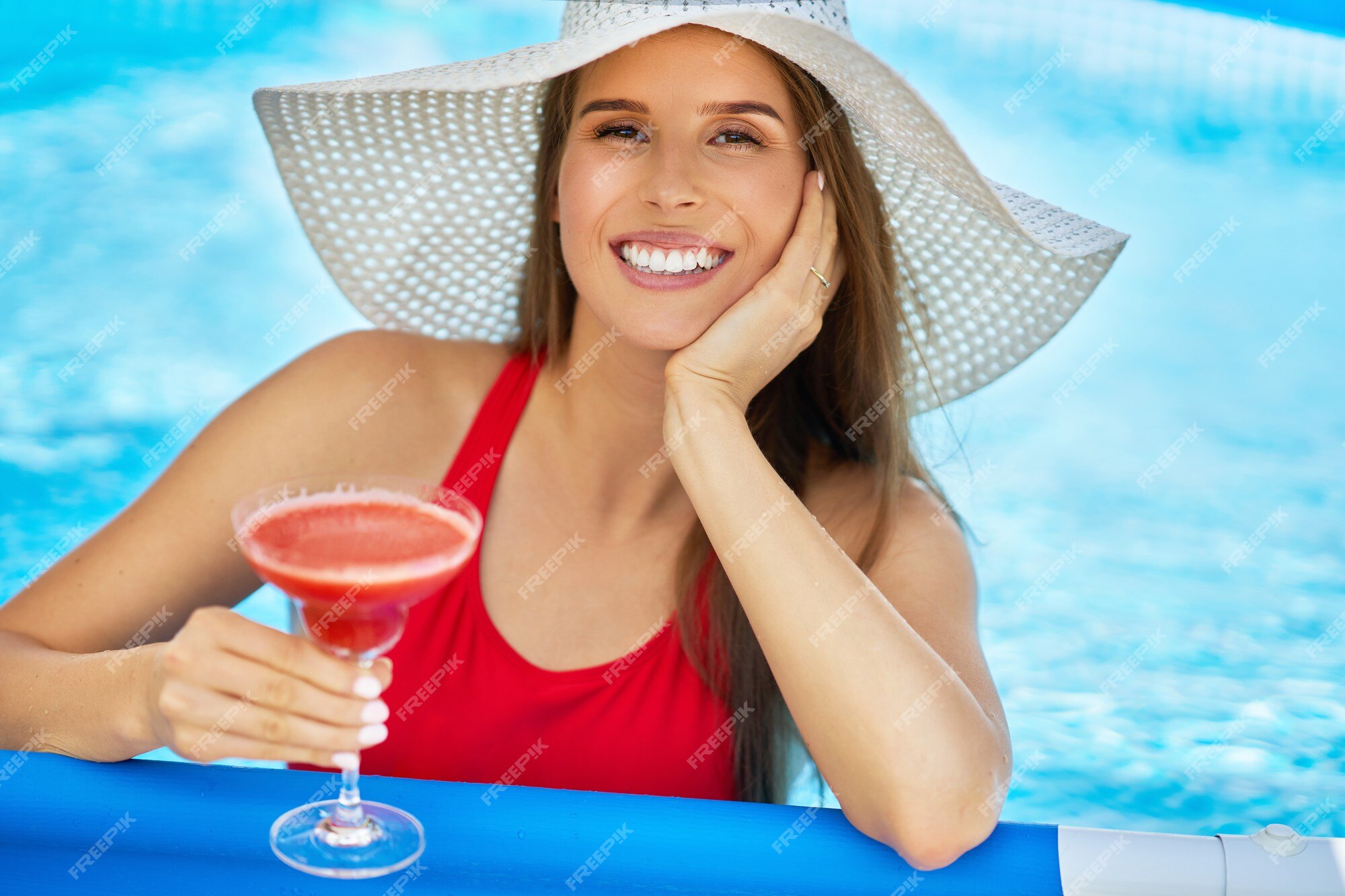 Premium Photo An Attractive Young Woman Relaxing On Swimming Pool In The Backyard 