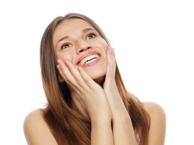 Attractive young woman smile and looking up