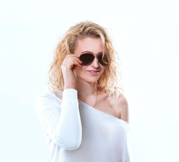 Attractive young woman in sunglasses.isolated on white background