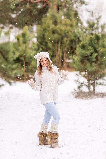 Attractive young woman in winter time outdoors