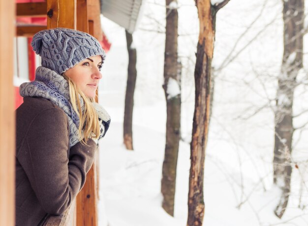 Attractive young woman in wintertime outdoor