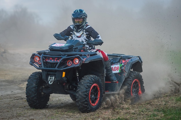 ATV UTV buggy 4x4 offroad vehicle in the mud and dust Extreme adrenalin