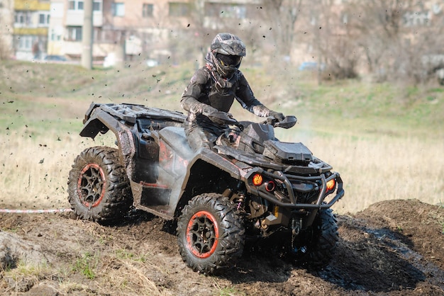 ATV UTV buggy 4x4 offroad vehicle in the muddy water Extreme adrenalin