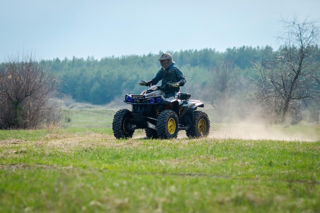 ATV and UTV offroad vehicle racing in a dust Extreme adrenalin 4x4