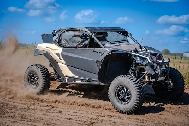 ATV and UTV riding in sandy dusty track Amateur competitions 4x4