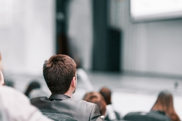 Audience in the hall of the business center