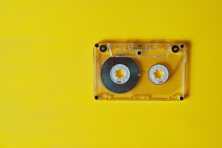 Photo audio cassette for recording music on a yellow background