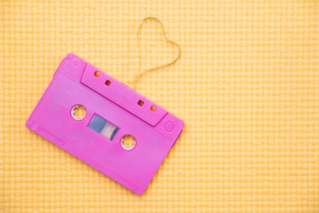Photo audio cassette with magnetic tape in shape of heart