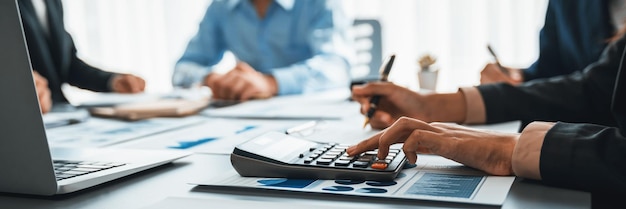 Auditor and accountant team working in office analyze financial data and accounting record with calculator Accounting company provide finance and taxation planning for profitable cash flow Insight