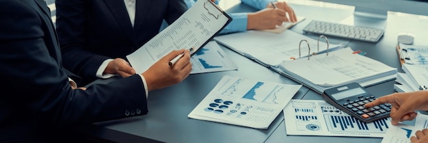 Auditor team collaborate in office analyzing financial data and accounting record Expertise in finance and taxation with accurate report and planning for company revenue expense and budget Insight