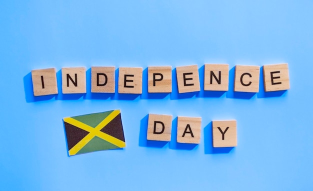 August 6 Jamaica Independence Day a minimalistic banner with the inscription in wooden letters