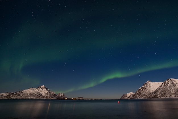 Aurora borealis, polar lights, over mountains in the North of Europe