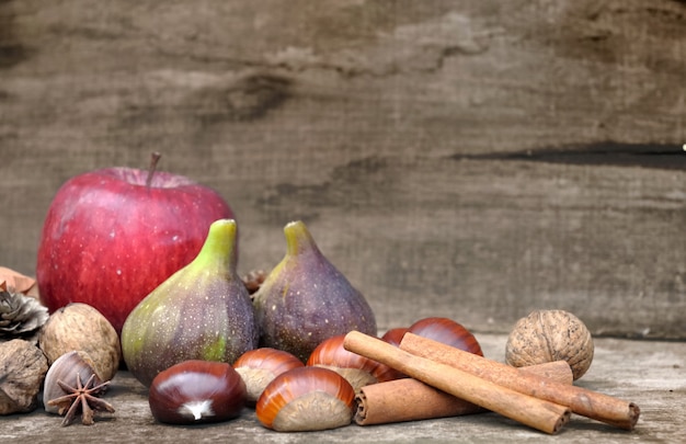 Aurumn fruits on rustic wooden