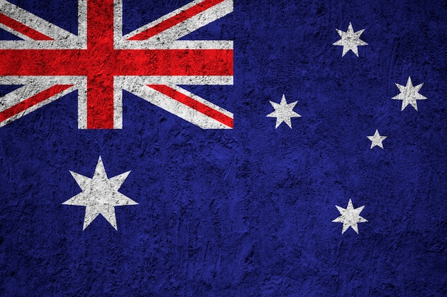 Photo australia flag painted on grunge wall